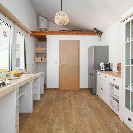 Holiday home Lovely In